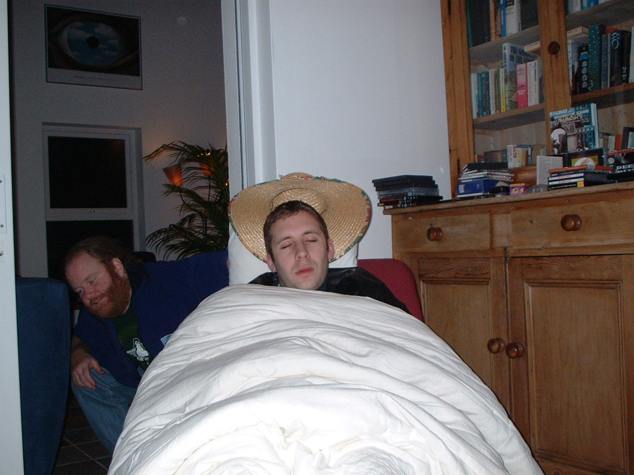 kevin helping shane join the hat series(tm) of pictures.
