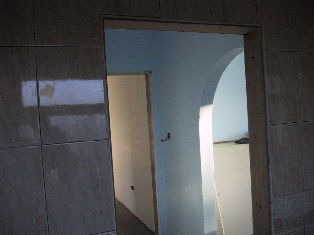 Inside the en suite looking into the hallway and the master bedroom.