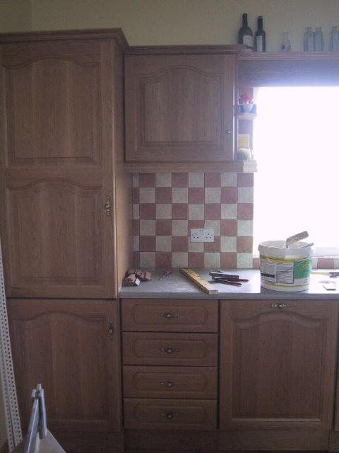 First bit of kitchen tiles done. First bit of kitchen tiles done.