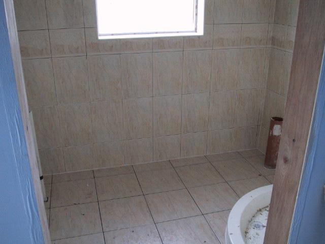Note the rounded edge around the shower...