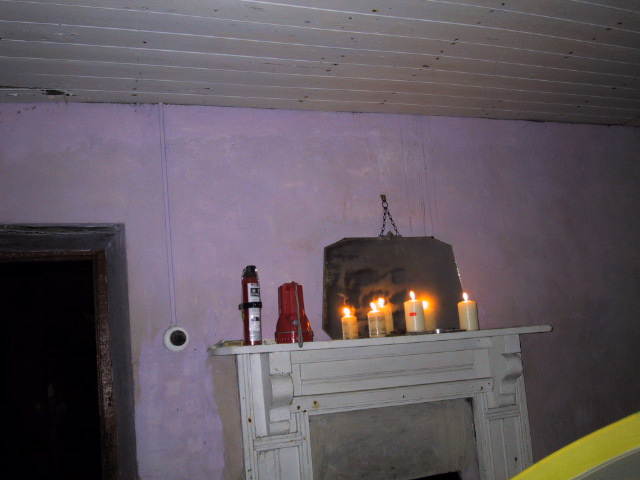 Ok, let's go though the list...  old cottage,check.  light by candles and lanterns, check.  spooky music and ghosts...  yikes!